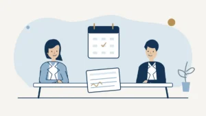 Employer and employee discussing a contract and calendar